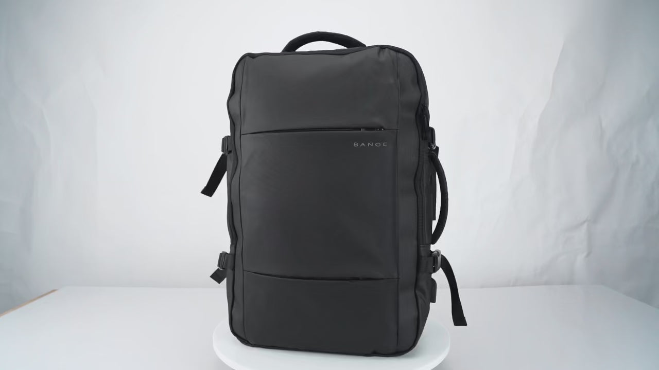 Video demonstration of the BANGE expandable travel backpack highlighting waterproof material, USB charging port, laptop compartment, anti-theft features, and ergonomic design for business and travel use.