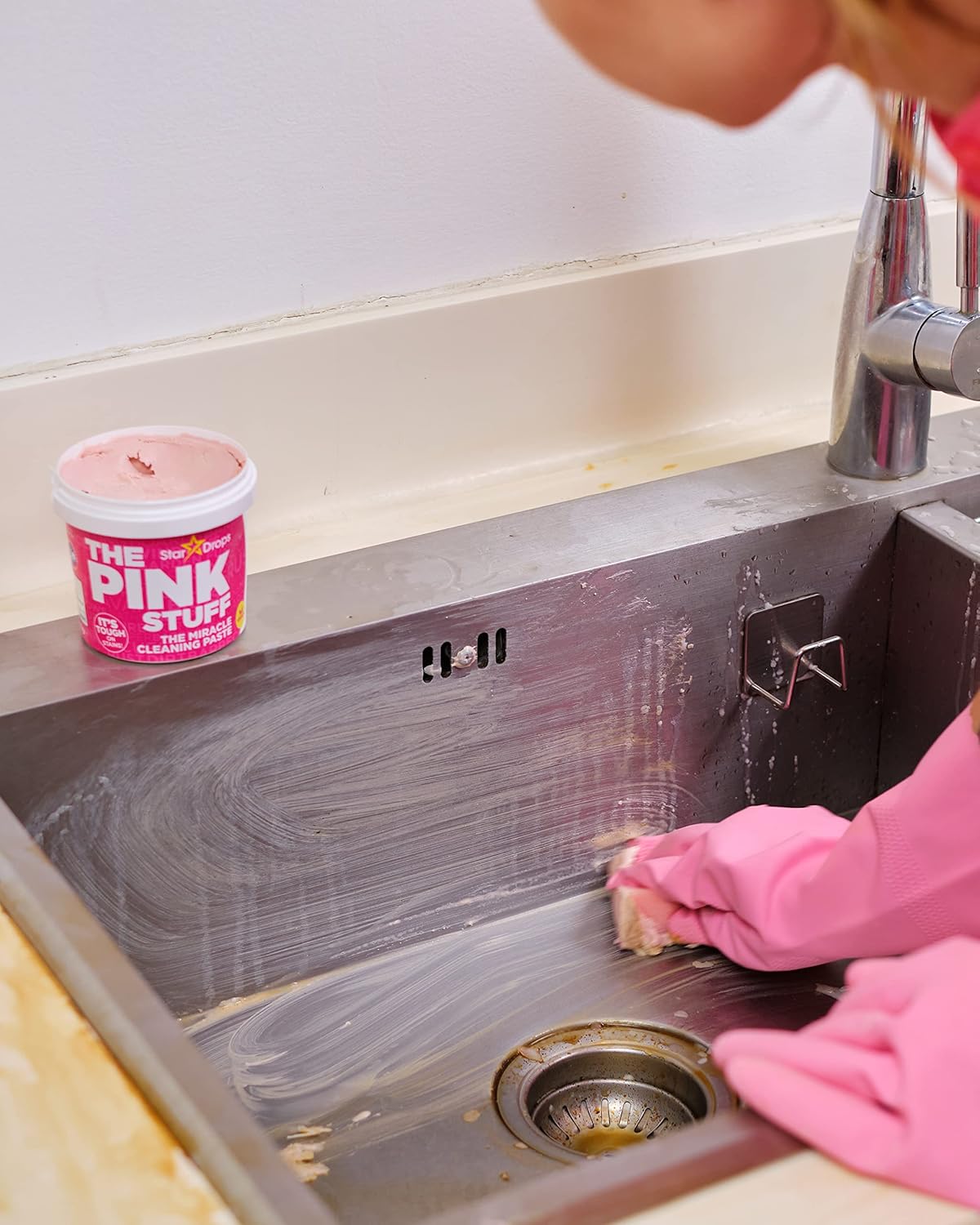 The Pink Stuff being applied to kitchen appliances