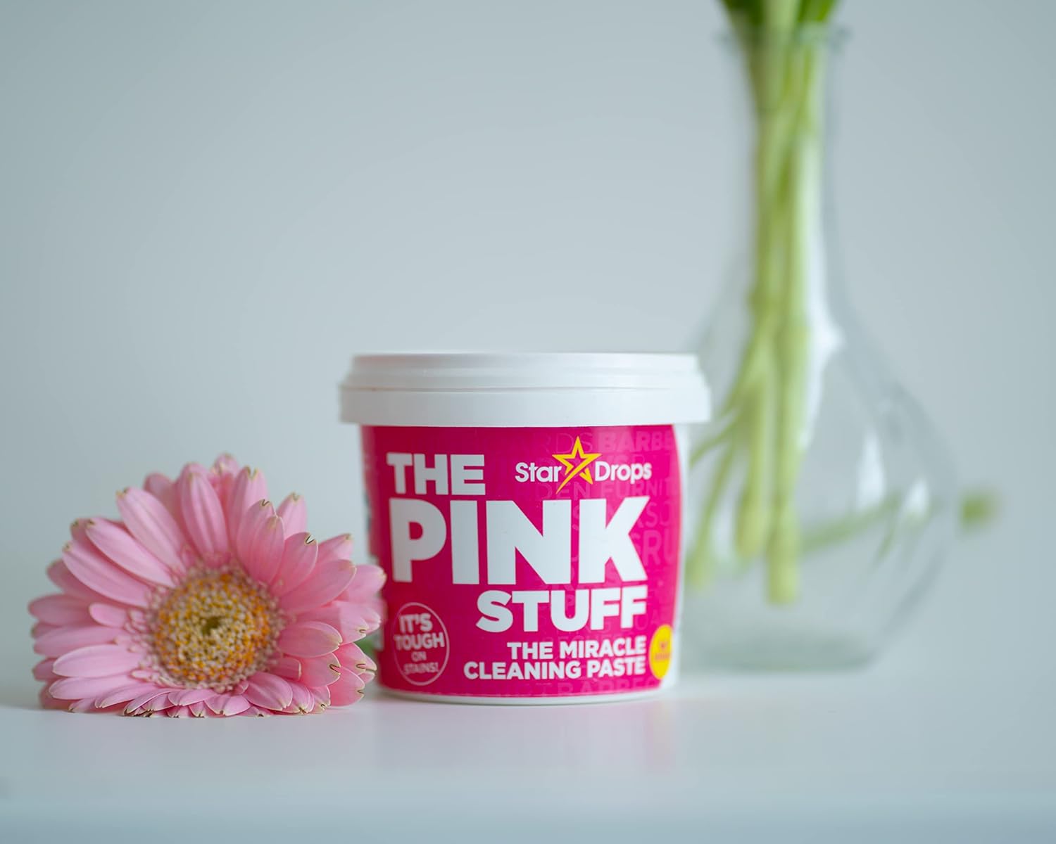 Removing water stains from a stainless steel sink with The Pink Stuff